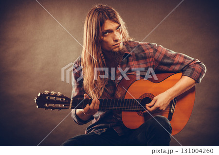 Guitarist is playing the guitar. Guitarist is playing the guitar. 131004260