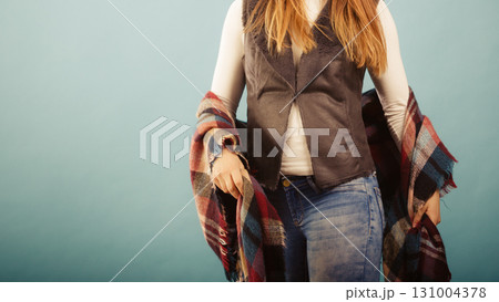 Fashionable girl in autumn warm clothing 131004378