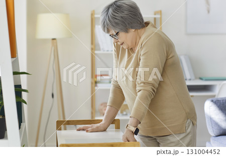 Elderly Woman Fainting From Dizziness At Home Elderly Woman Fainting From Dizziness At Home 131004452