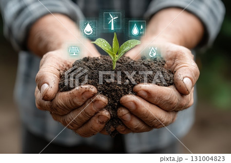 Hands Holding Soil with Glowing Seed Symbolizing Growth and Environmental Sustainability Hands Holding Soil with Glowing Seed Symbolizing Growth and Environmental Sustainability 131004823