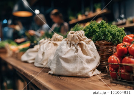 Bright Organic Market Table Displaying Fresh Leafy Greens, Tomatoes, and Natural Produce 131004931