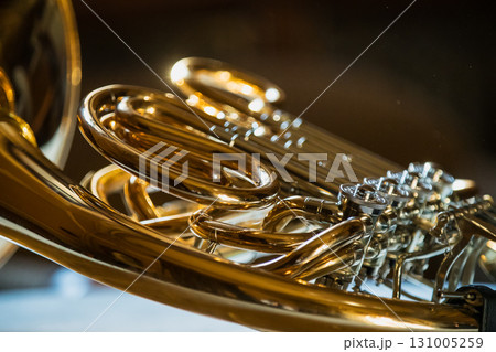 Horn instrument, hands playing horn player in philharmonic orchestra 131005259