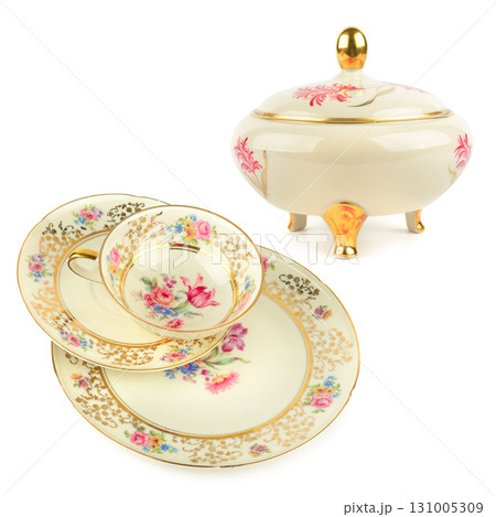 A Vintage Porcelain Tea Set with Gold Accents. A Vintage Porcelain Tea Set with Gold Accents. 131005309