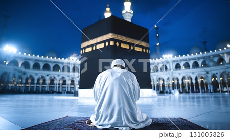 Devotee Praying Before the Kaaba in Mecca. Devotee Praying Before the Kaaba in Mecca. 131005826