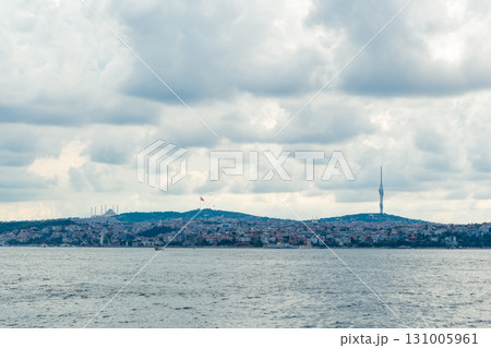 Istanbul, Turkey. Scenic view of the Bosphorus Strait with city view in the background. Urban skyline and city life. Istanbul, Turkey. Scenic view of the Bosphorus Strait with city view in the background. Urban skyline and city life. 131005961