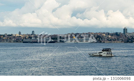 Istanbul, Turkey. Scenic view of the Bosphorus Strait with city view in the background. Urban skyline and city life. Istanbul, Turkey. Scenic view of the Bosphorus Strait with city view in the background. Urban skyline and city life. 131006098