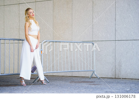 Woman wearing crop top and culottes 131006178