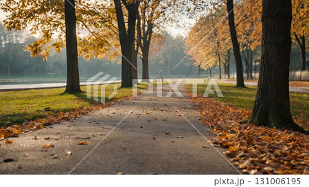 An athlete jogs in an autumn park among colorful leaves. Concept of men's fitness and a healthy lifestyle in nature. 131006195