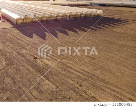 Aerial view. Commercial greenhouses on coast, Spain. 131006485