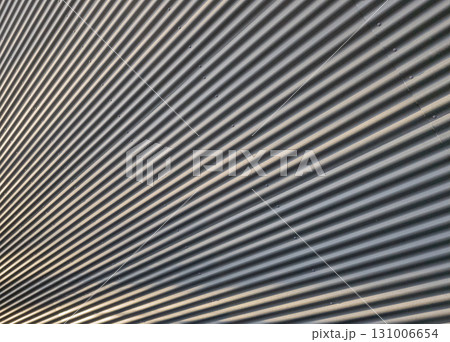 Corrugated Metal Wall Texture with Shadows and Highlights 131006654