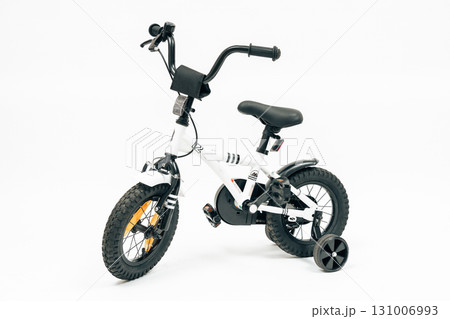 Childrens small bicycle product shot on white background. Great for online retail, family branding and sporting lifestyle campaigns Childrens small bicycle product shot on white background. Great for online retail, family branding and sporting lifestyle campaigns 131006993