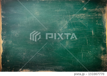 Surface of a green chalkboard displaying a textured, worn appearance, ideal for writing or drawing in classrooms and creative environments Surface of a green chalkboard displaying a textured, worn appearance, ideal for writing or drawing in classrooms and creative environments 131007770