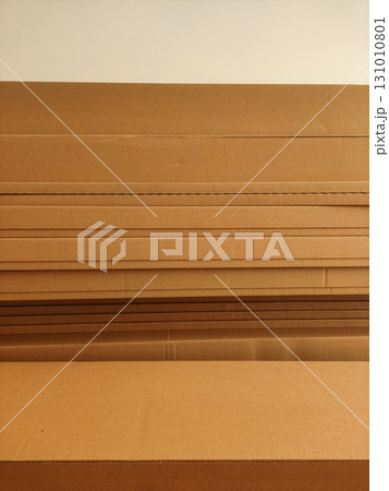 Stack of cardboard boxes forming a horizontal pattern 131010801
