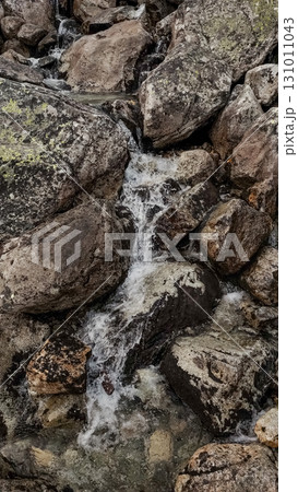 Water flowing down rocks in high tatras mountains, slovakia Water flowing down rocks in high tatras mountains, slovakia 131011043