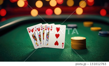 Casino table with poker chips and royal flush in hearts under warm lights. Classic gambling atmosphere. Generative AI. Casino table with poker chips and royal flush in hearts under warm lights. Classic gambling atmosphere. Generative AI. 131012763
