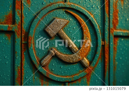 Hammer and Sickle Emblem on Weathered Teal Metal With Raindrops and Rust 131015079