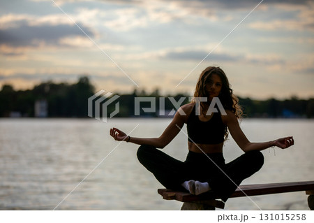 Experience a Peaceful Evening Meditation by the Water, allowing yourself to find true calm Experience a Peaceful Evening Meditation by the Water, allowing yourself to find true calm 131015258