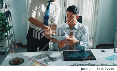 Top view of skilled businessman walking and give house design. Alimentation. 131015549