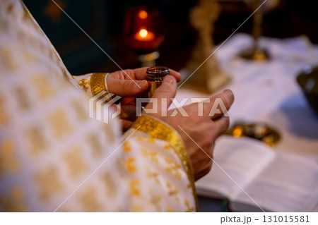 A grand Religious Ceremony with Golden Attire and Sacred Objects highlights cultural beliefs A grand Religious Ceremony with Golden Attire and Sacred Objects highlights cultural beliefs 131015581