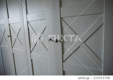 Discover Elegant White Barn Door Cabinets that Enhance a Modern Interior Aesthetic Effortlessly 131015706