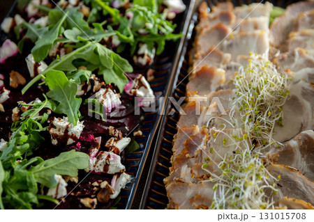 Delicious Gourmet Salad accompanied by a Charcuterie Platter specifically designed for Events 131015708
