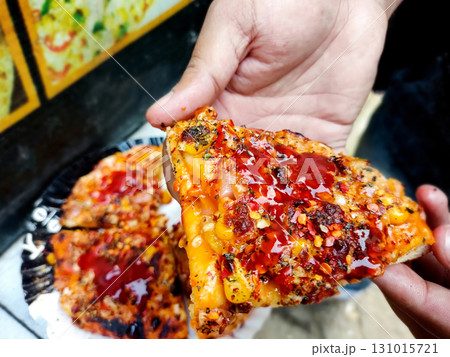 Street-Style Pizza with Cheese, Corn, and Sauce 131015721