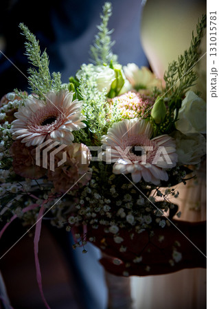 A Beautiful Floral Bouquet Featuring Charming Pink Gerberas with Delightful Delicate Accents 131015781