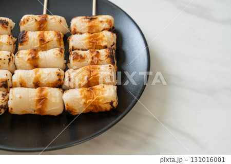 grilled tube shaped fish paste cake skewe or tube squid skewer 131016001