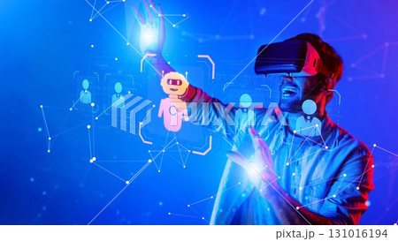 Excited Man Using Virtual Reality Headset in a Futuristic Digital Environment with Interactive Elements and 3D Graphics. Raster 131016194