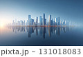 朝焼けに染まる未来都市の高層ビル群と静かな水面の反射 131018083