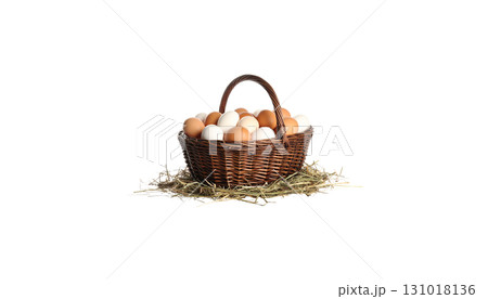 Rustic wicker basket full of eggs on white background 131018136
