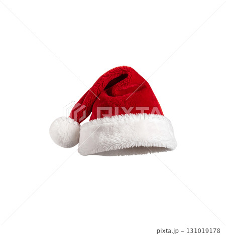 A bright red Santa hat with white fur trim sits on a white background A bright red Santa hat with white fur trim sits on a white background 131019178