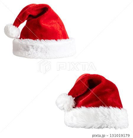 A bright red Santa hat with white fur trim sits on a white background A bright red Santa hat with white fur trim sits on a white background 131019179