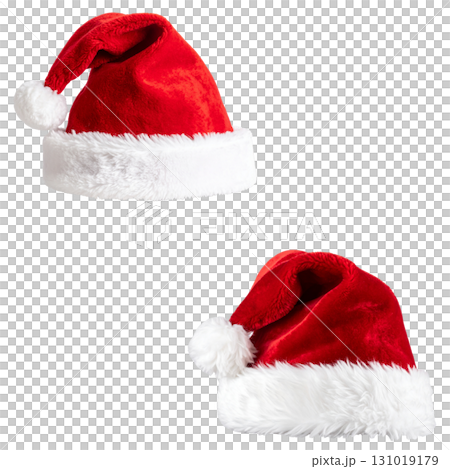A bright red Santa hat with white fur trim sits on a white background A bright red Santa hat with white fur trim sits on a white background 131019179