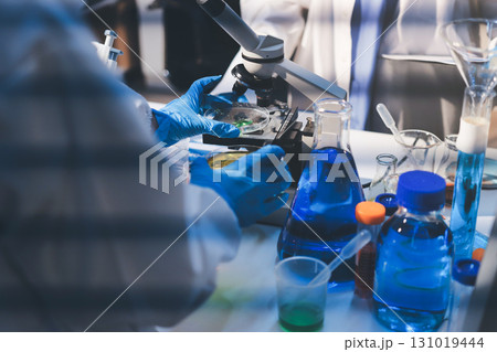 Researchers working in the clinical laboratory 131019444