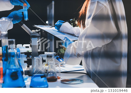 Researchers working in the clinical laboratory Researchers working in the clinical laboratory 131019446