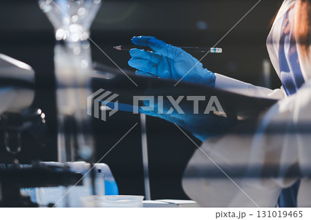 Researchers working in the clinical laboratory 131019465