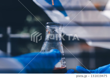 Researchers working in the clinical laboratory 131019475