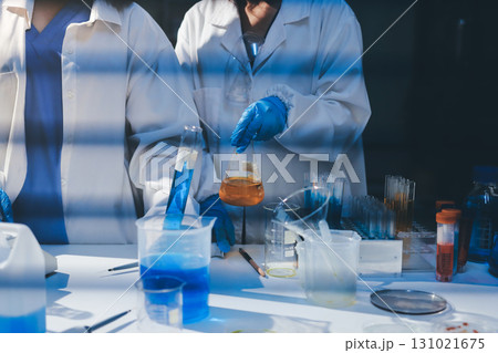 Researchers working in the clinical laboratory Researchers working in the clinical laboratory 131021675