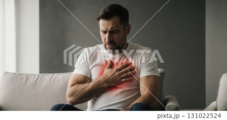 People suffering from chest pain holding chest showing discomfort and health problem People suffering from chest pain holding chest showing discomfort and health problem 131022524
