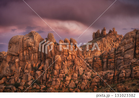 A Stunning and Beautiful Desert Landscape that Features Vibrant Sunset Lighting A Stunning and Beautiful Desert Landscape that Features Vibrant Sunset Lighting 131023382