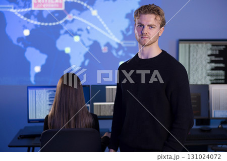 Cybersecurity team working on threat detection in a high-tech SOC environment 131024072