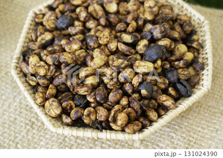 Coffee beans showing various stages of roasting from raw Coffee beans showing various stages of roasting from raw 131024390