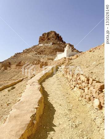Exploring the troglodyte village of Qirmisah in Tataouine, Tunisia, showcasing unique architecture Exploring the troglodyte village of Qirmisah in Tataouine, Tunisia, showcasing unique architecture 131026140