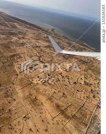 Overview of the Djerba region in Tunisia from an airplane during a scenic flight over its arid 131026165