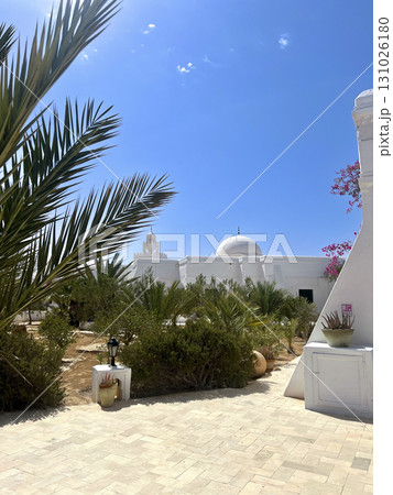 Exploring the unique architecture of Musee Guellala in Djerba, Tunisia on a sunny day 131026180