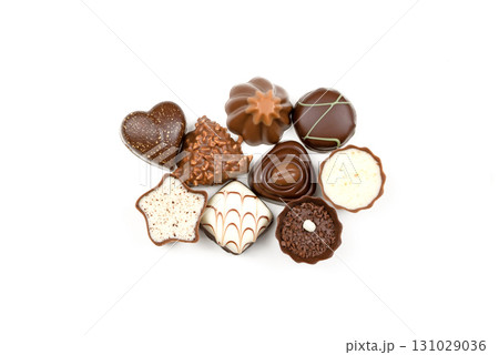 A collection of assorted chocolates with different shapes and sizes 131029036