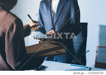 Lawyer explained to the client about the law that must be brought against the court case. Lawyer explained to the client about the law that must be brought against the court case. 131030719