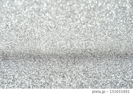 Close up of sparkling silver glitter texture with bright, shimmery surface 131031891