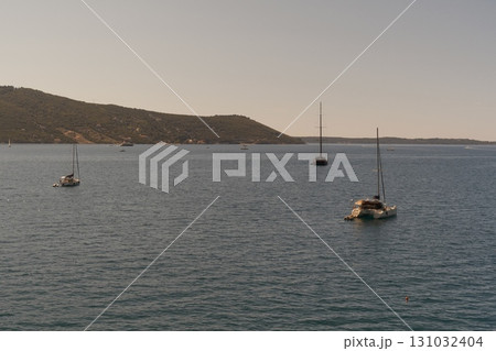boats anchored in the sea boats anchored in the sea 131032404